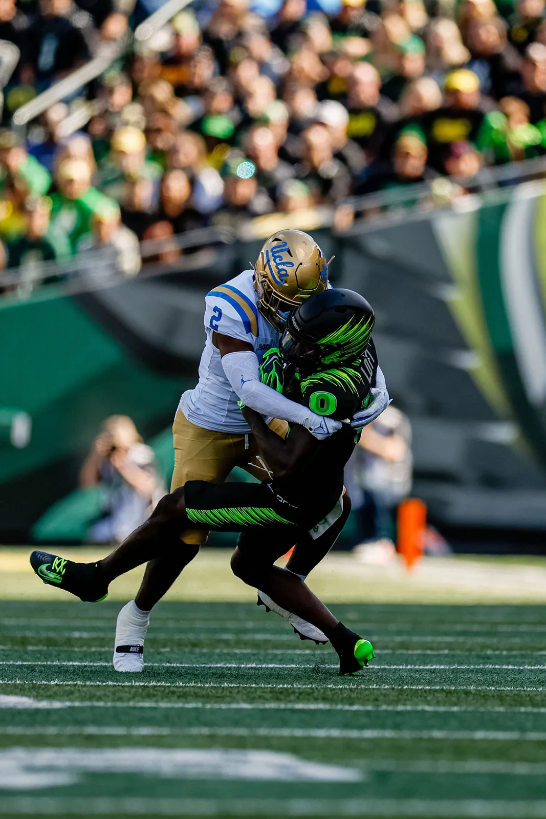 Rodrick Pleasant wraps up an Oregon player