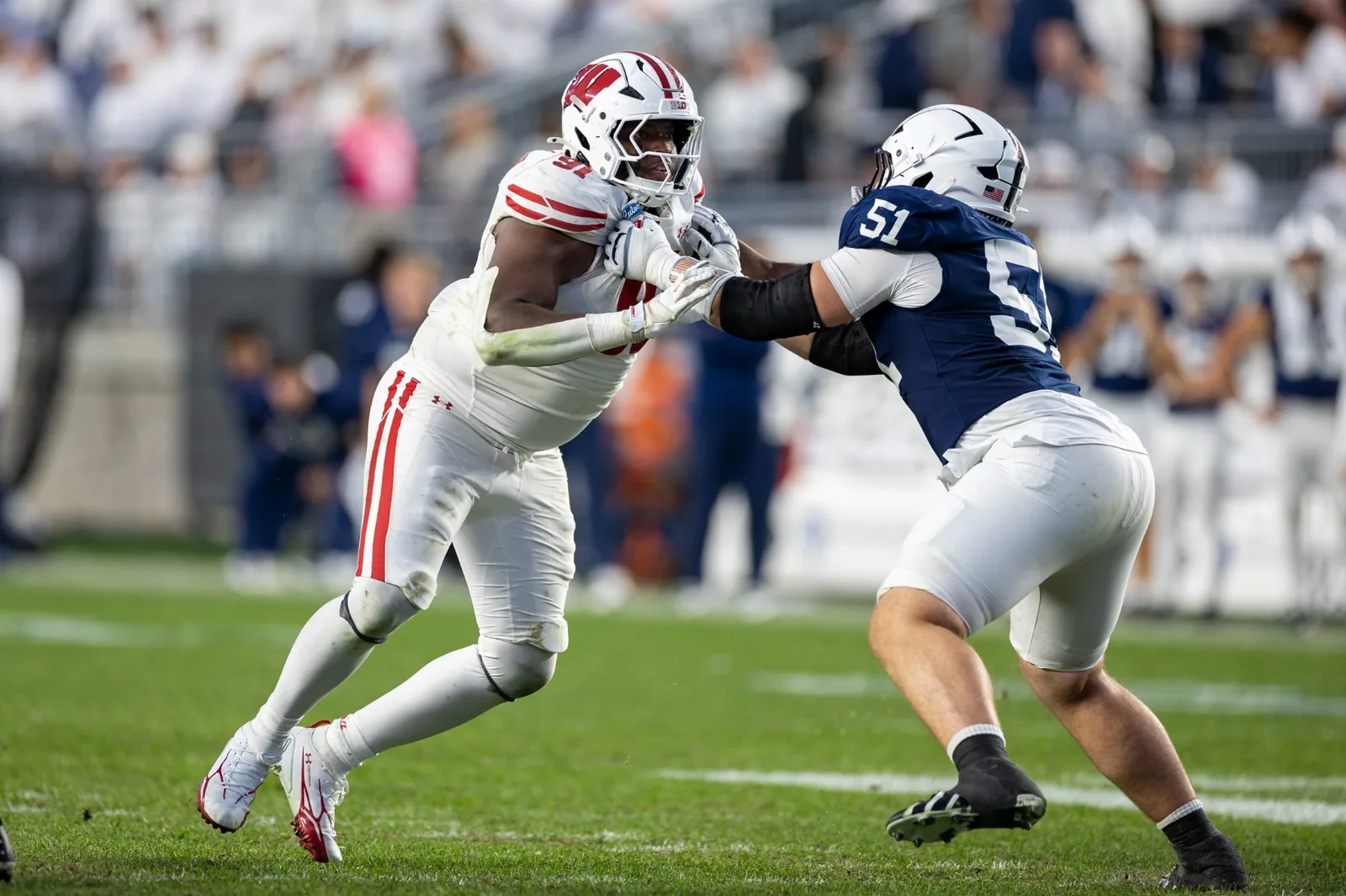 Hammond Russell IV defends against Penn State on September 26, 2026.