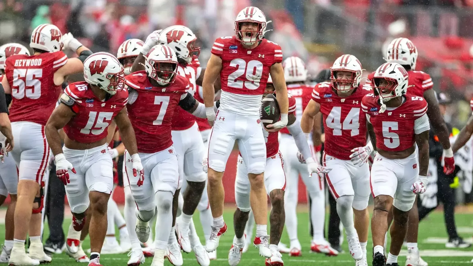 Matt Jung and Wisconsin teammates celebrate against Eastern Michigan
