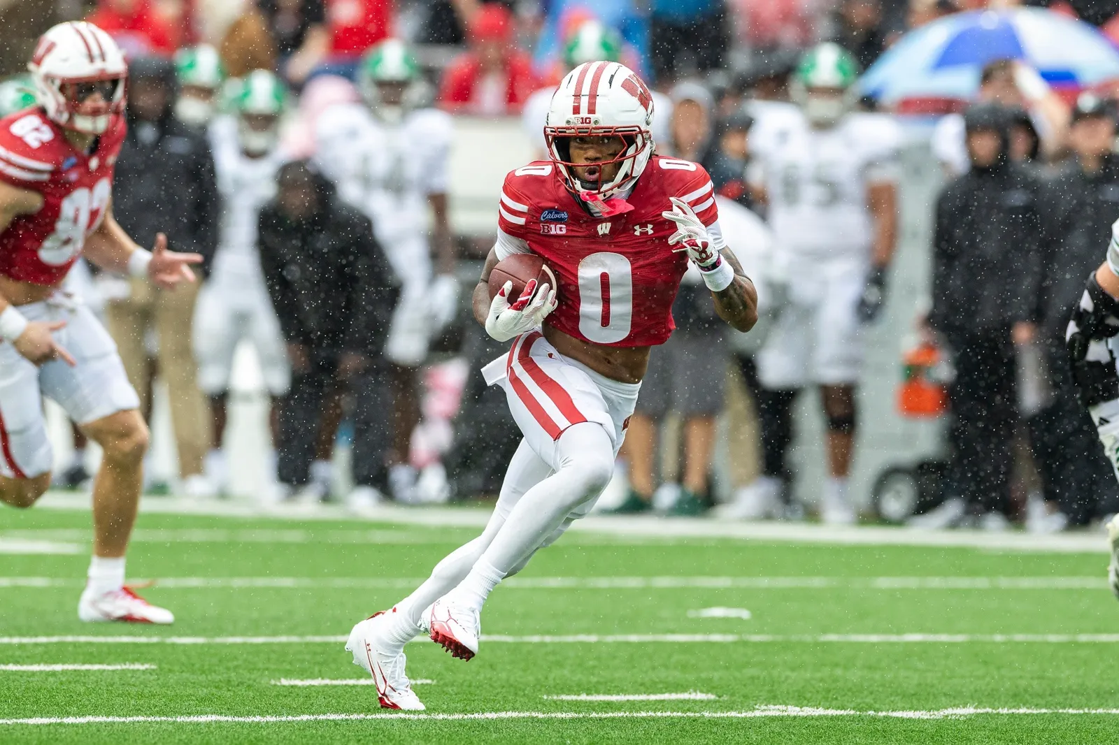 Tyrell Henry runs a route against Eastern Michigan