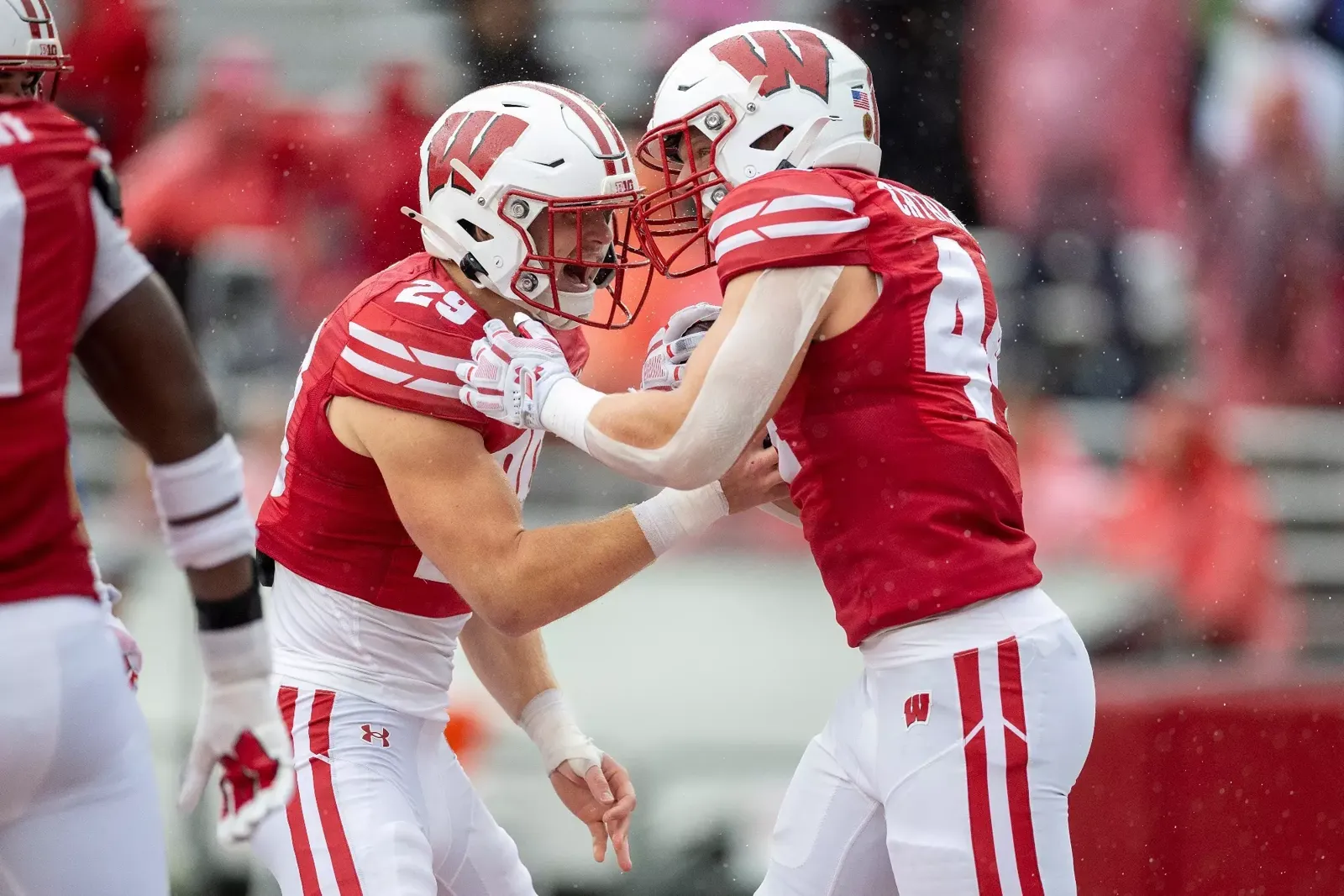 Matt Jung and Cooper Catalano celebrate against Eastern Michigan